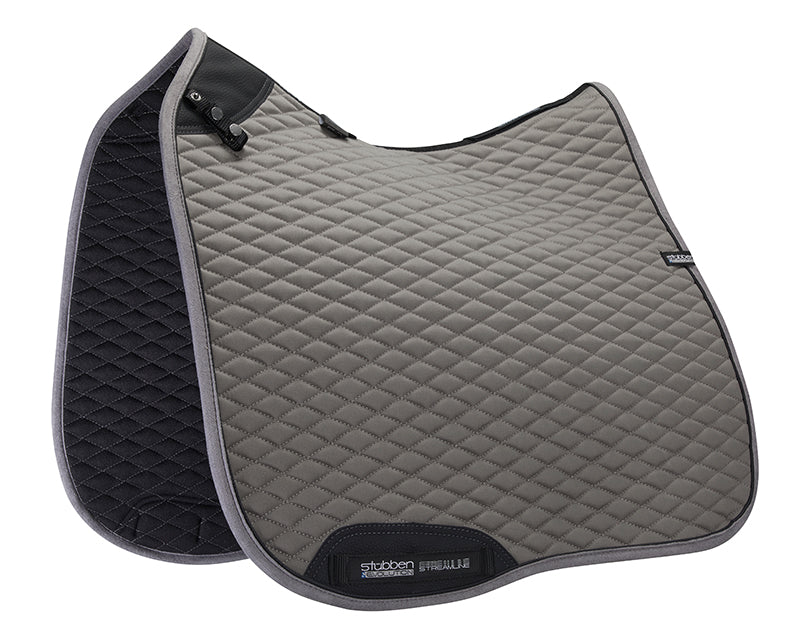 Horse wearing the Stübben Streamline GEN2 Dressage Pad beneath a dressage saddle.