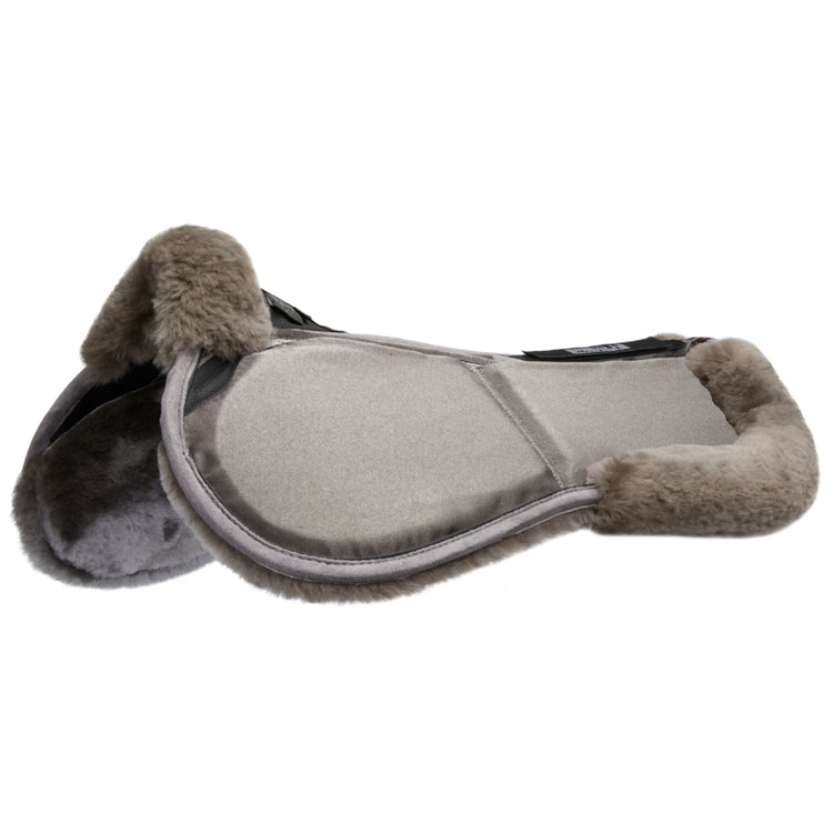Stübben horse saddle fit half pad with soft lambswool and removable inserts.