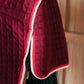 Thermoregulating horse cooler rug allowing moisture to escape efficiently.