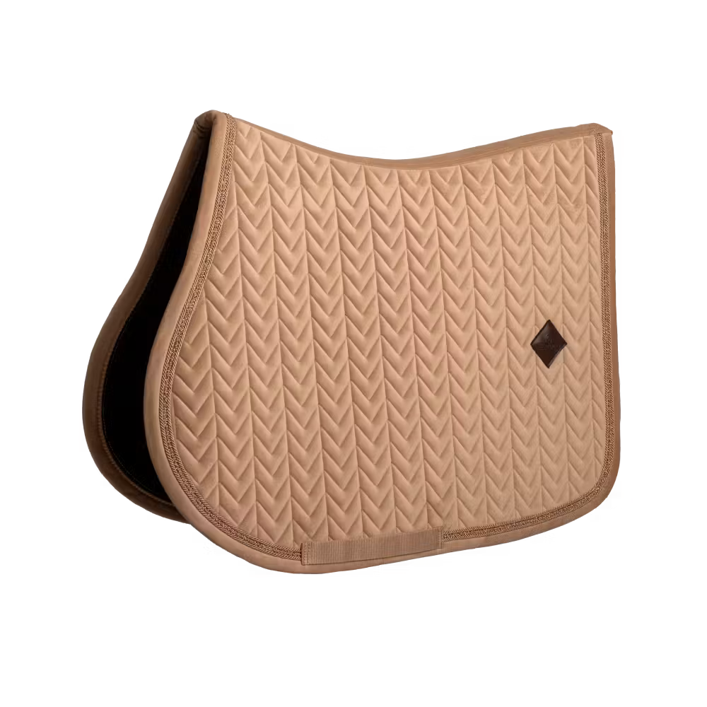 Velvet saddle pad with pearls for training and competition.