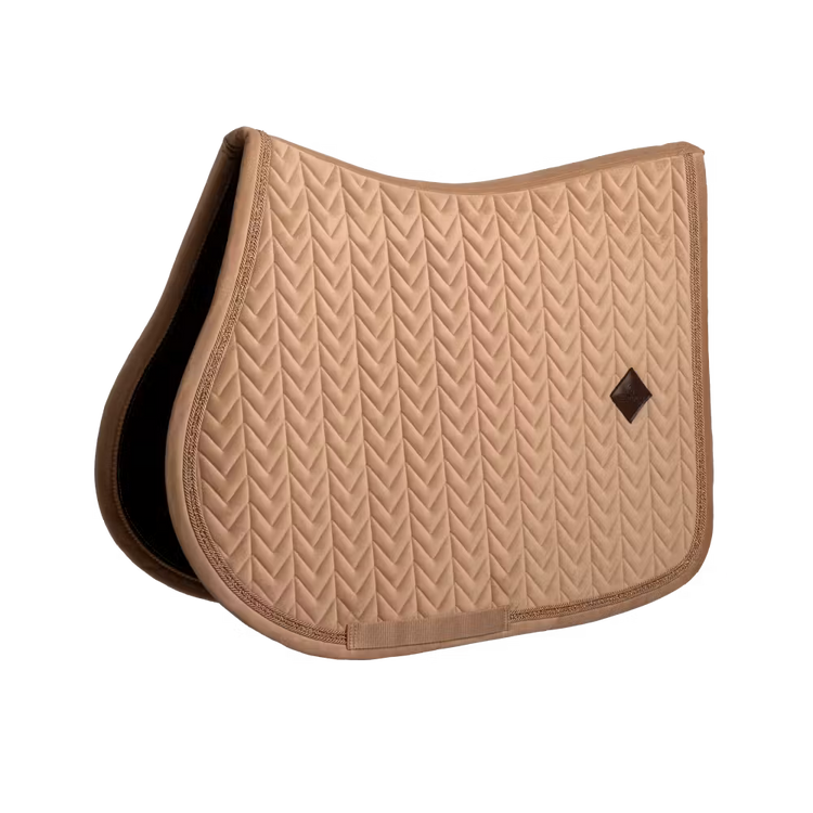 Velvet saddle pad with pearls for training and competition.