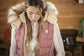 Warm stable gilet for women with comfortable elasticated detailing.