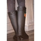 Waterproof pink stable boots designed for wet and muddy conditions around the yard.