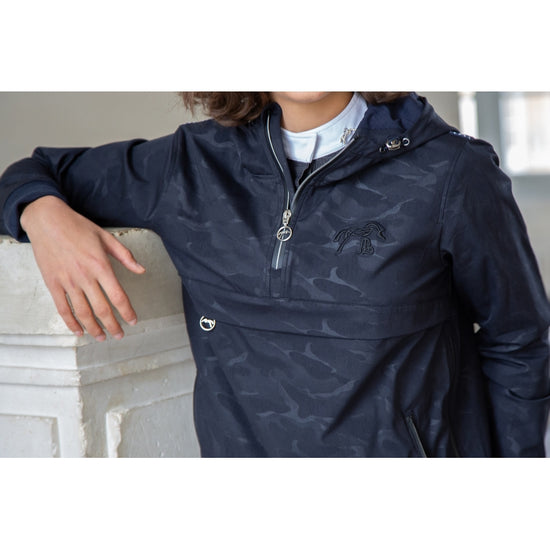 Waterproof riding jacket for horse riders in wet weather.