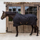 Waterproof turnout rug 0g for horses during wet transitional weather.