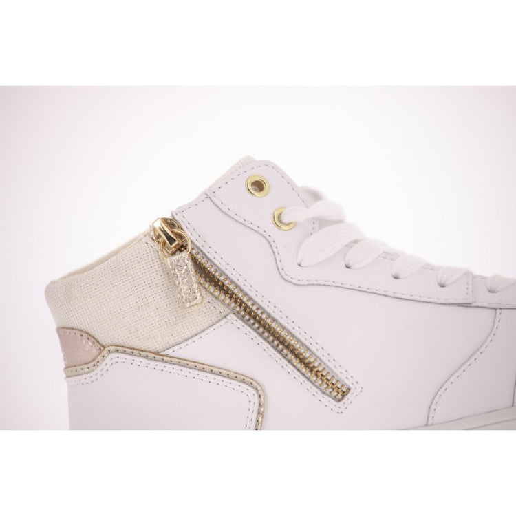 White sneakers for horse shows and comfortable everyday outfits.