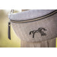 Equestrian crossbody waist bag with multiple zipped pockets for secure everyday storage.