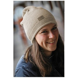 Women’s equestrian beanie for stable and everyday wear.
