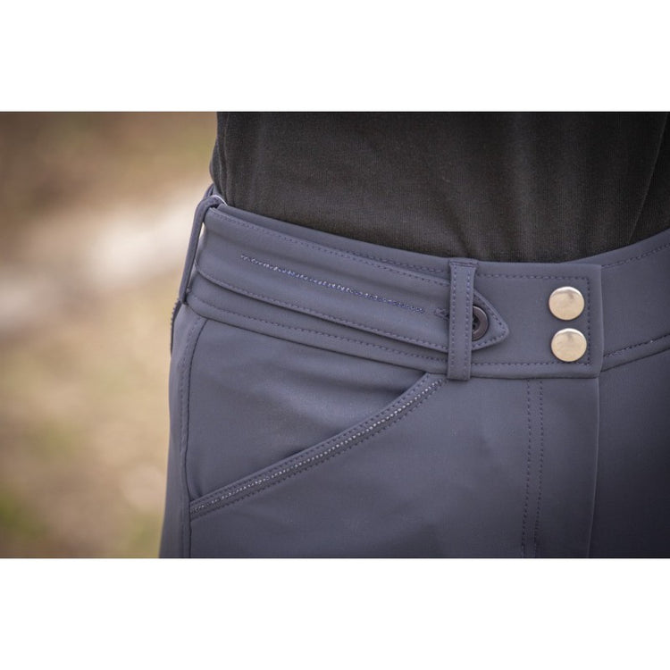 Women’s equestrian breeches with silicone knee grip for secure contact.