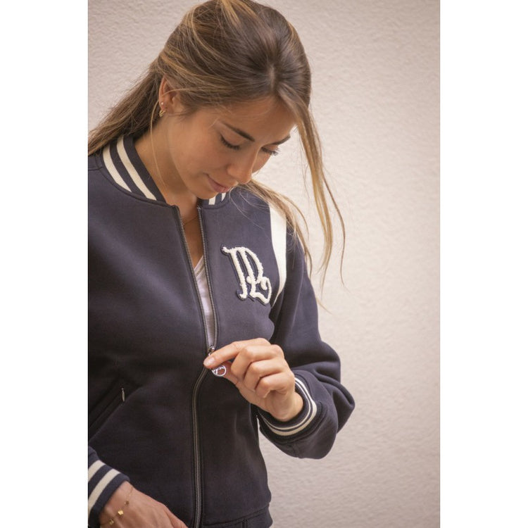 Women’s equestrian jacket with fluffy 3D logo detailing.