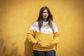 Women’s fleece equestrian hoodie for warm and comfortable stable wear.