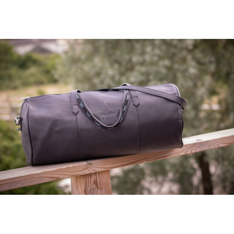 Women’s leather shoulder travel bag with removable long strap.