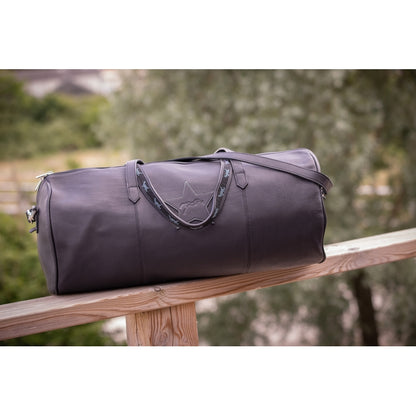 Women’s leather shoulder travel bag with removable long strap.