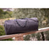 Women’s leather shoulder travel bag with removable long strap.