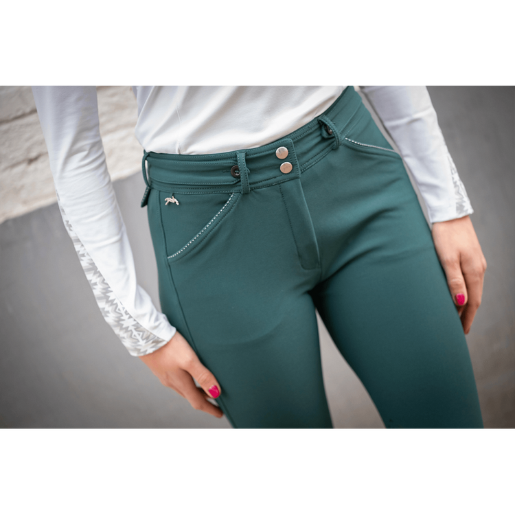 Women’s riding breeches with Lycra ankle panels for reduced bulk under boots.