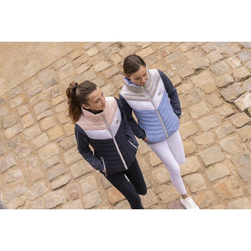 Women’s riding vest with high neck for comfortable equestrian wear.