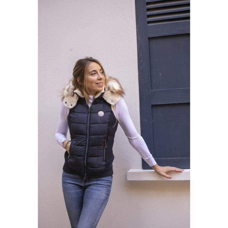 Women’s winter equestrian vest with practical sleeveless construction.