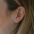 Penelope Millie horse earrings in a silver finish.