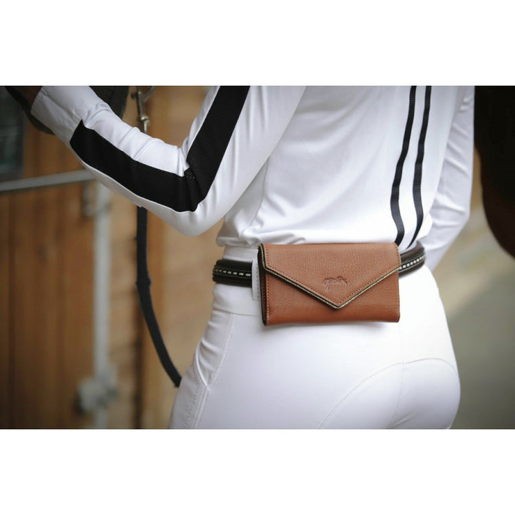 Horse riding phone pouch for convenient smartphone storage.