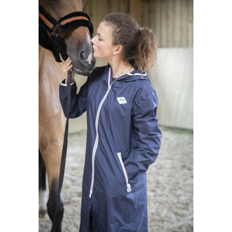 Horse riding raincoat with leg straps to help keep the coat in place in the saddle.