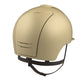 Gold equestrian helmet