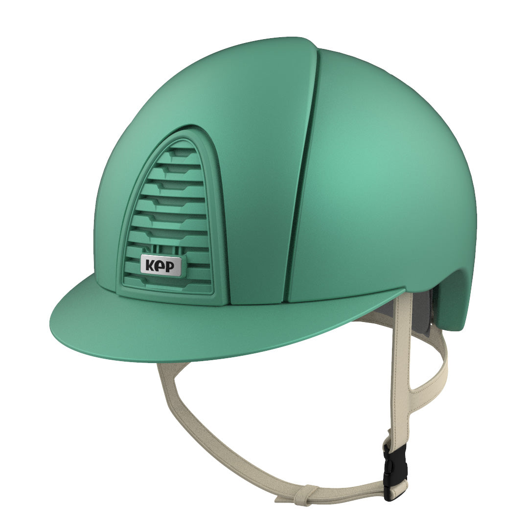 Turquoise colored horse riding helmet