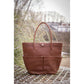 Leather stable bag for horse riders with practical storage compartments.