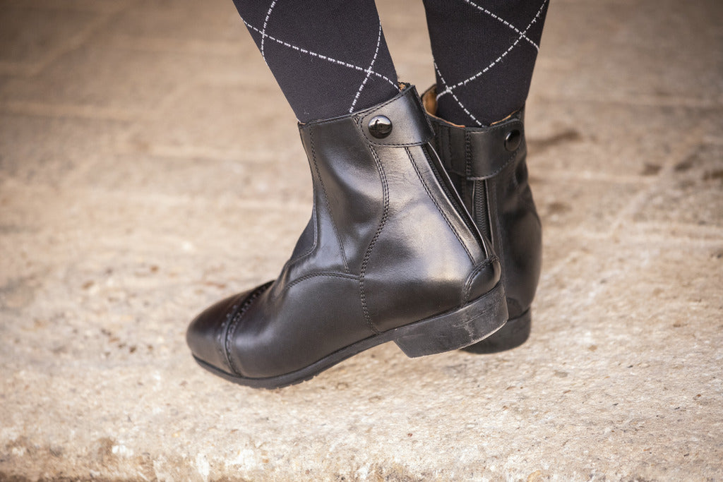 Penelope Celeste riding ankle boots with a practical back zip.