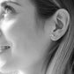 Penelope horse logo earrings with an elegant equestrian look.