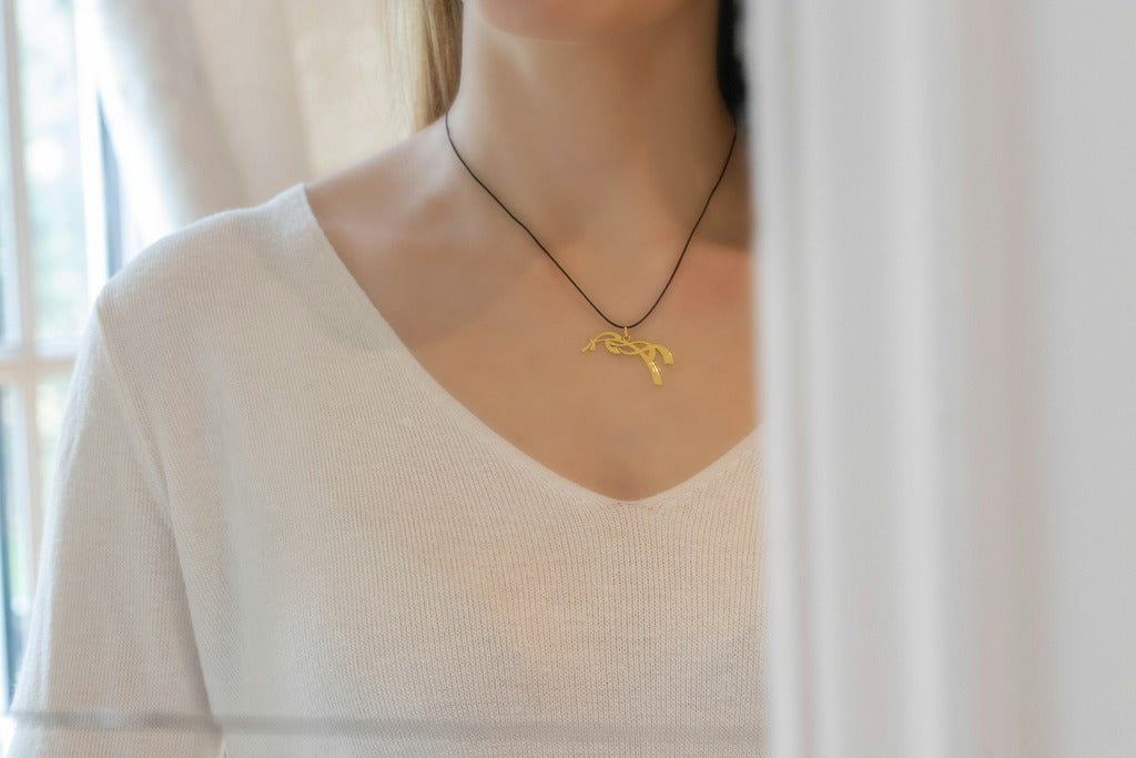 Penelope horse pendant necklace for women and equestrian enthusiasts.
