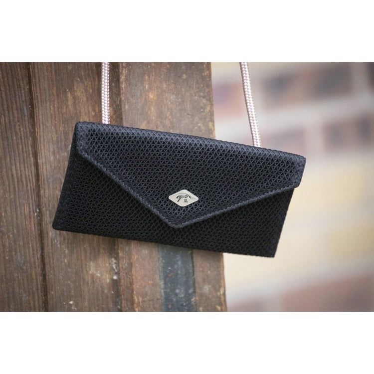 Penelope horse riding phone pocket for convenient smartphone storage.