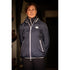 Waterproof jacket for horse riders during rainy training and stable days.
