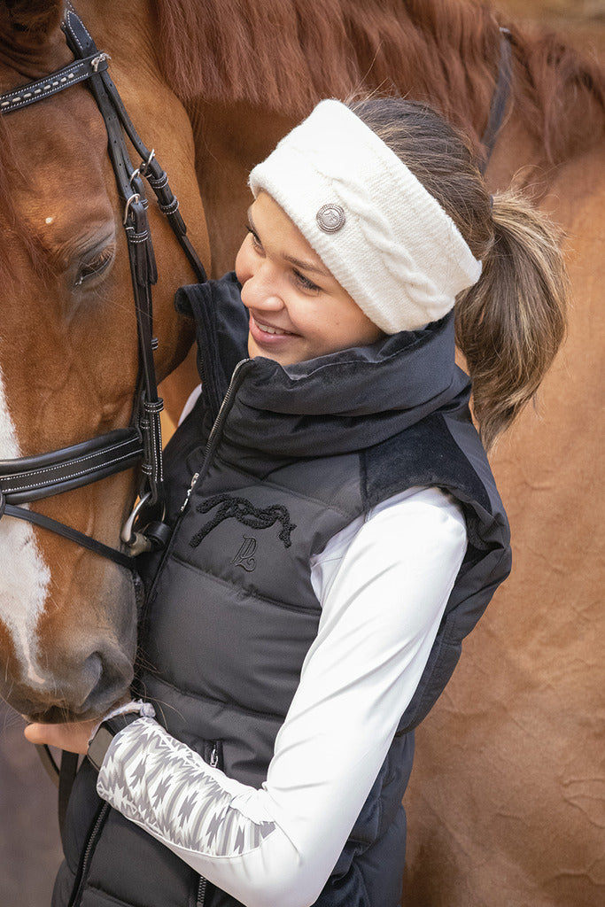 Penelope Sonia winter riding vest with generous velvet-lined collar.
