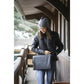 Penelope Thin Pocket laptop bag with silver zip and leather detailing.