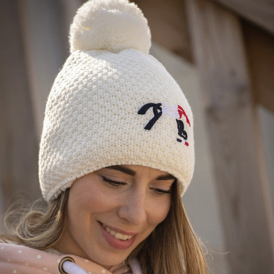 Penelope Timy Knitted Hat with soft and fluffy fleece lining.