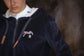 Penelope women’s equestrian velvet hoodie with contrasting white stitching