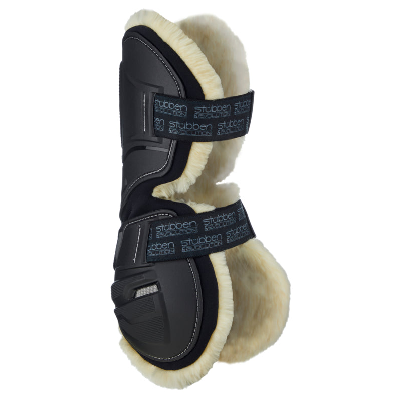 Stübben Hybrid horse boots combining protective leg coverage with a soft fleece interior.