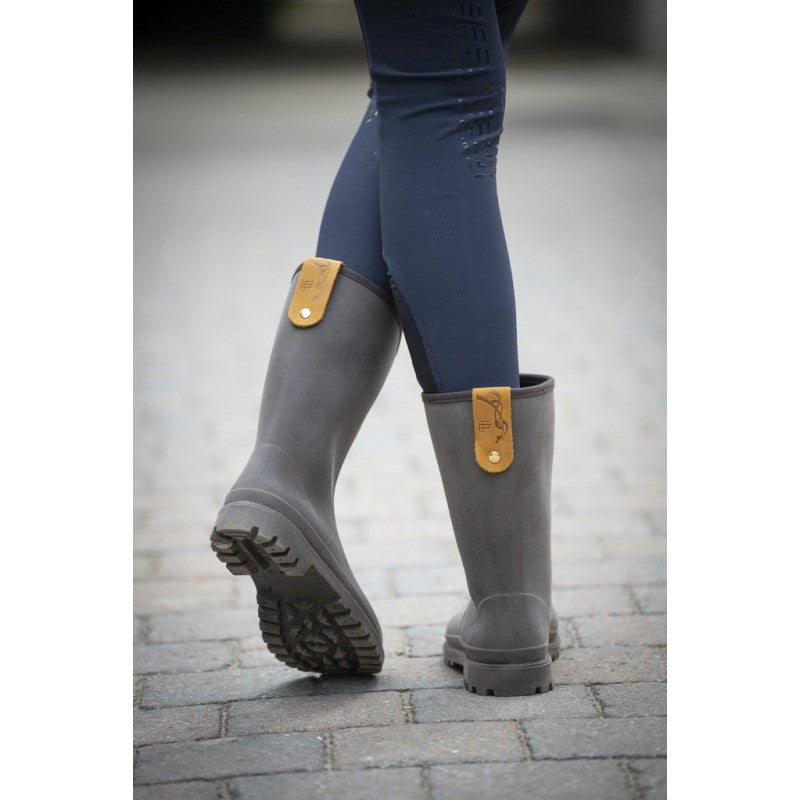 Women’s equestrian rain boots for wet and muddy stable conditions.