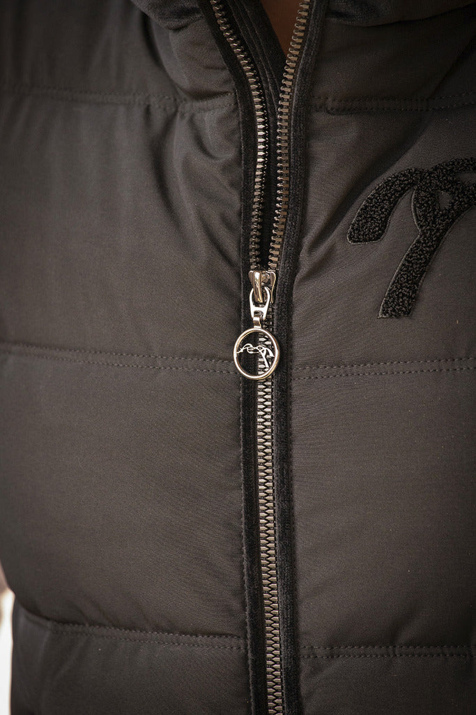 Women’s faux fur riding vest for equestrian and everyday wear.
