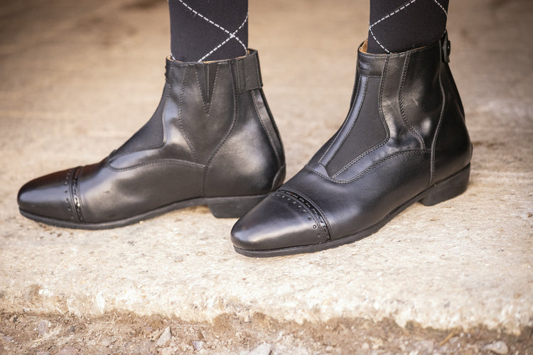 Women’s horse riding ankle boots with an elegant leather design.