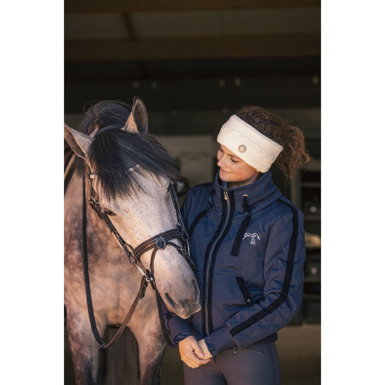 Women’s horse riding jacket with a comfortable high-collar design.